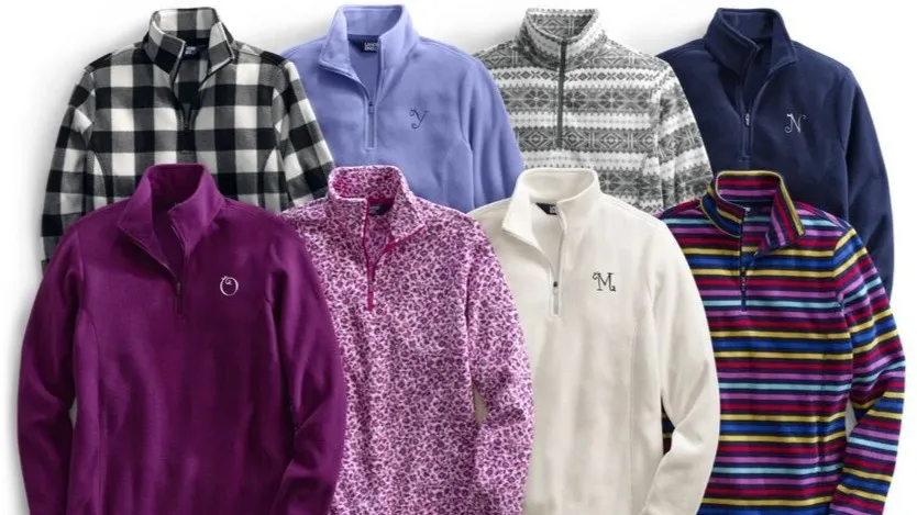 Eight quarter zip fleece pullovers.