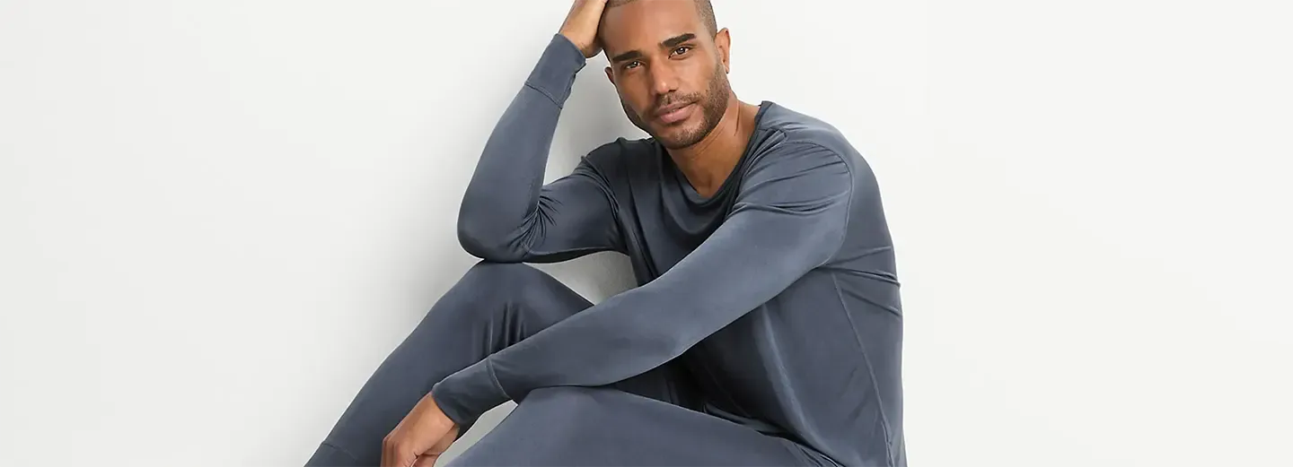 Man wearing a gray thermal base layer.