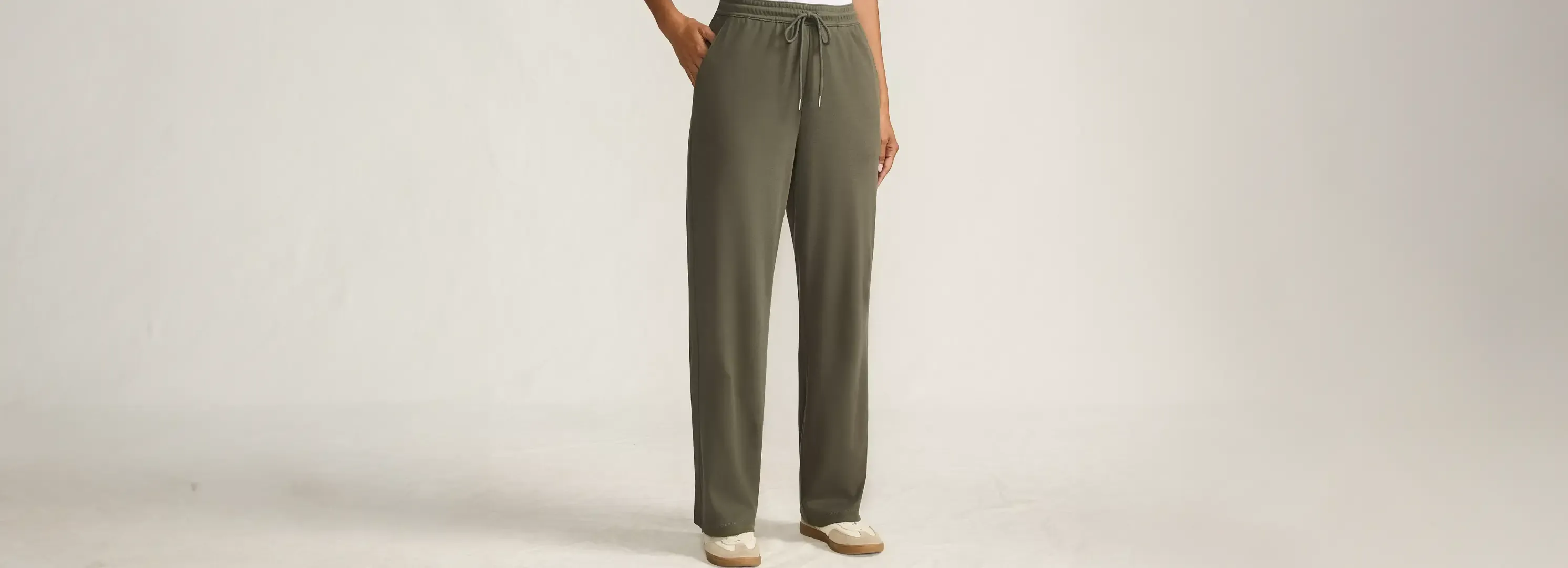 Olive green lounge pants with drawstring.
