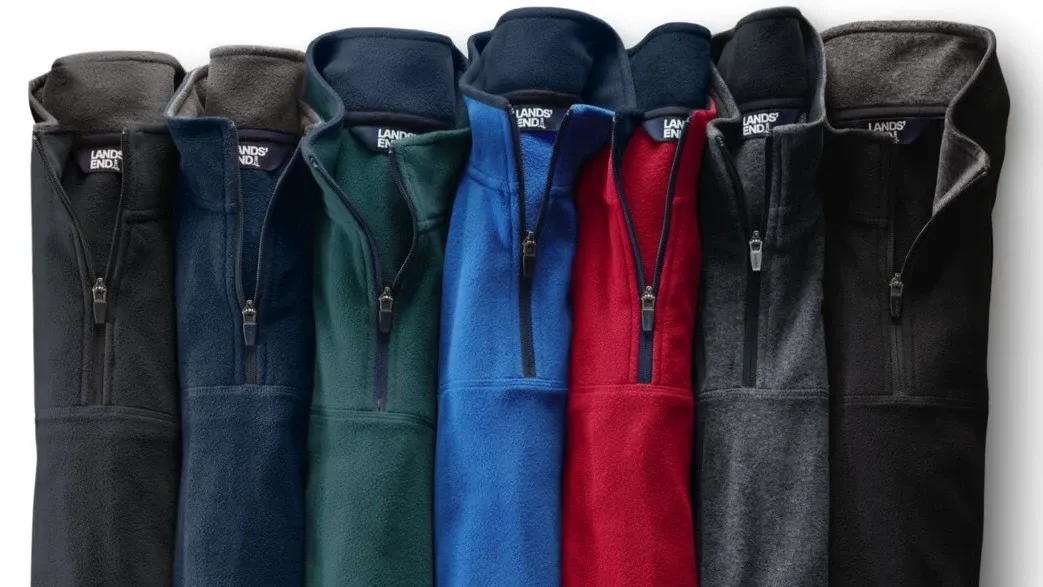 Seven performance quarter zip pullovers.
