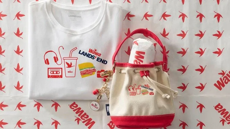 Wawa x Lands' End Shorti Tee next to a Shorti Tote with Shorti hoagie inside and Shorti Charm attached.