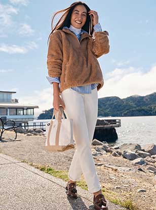 Woman wearing a sweater and pants