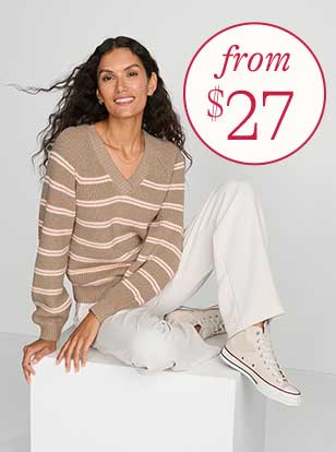 Woman wearing a sweater and pants