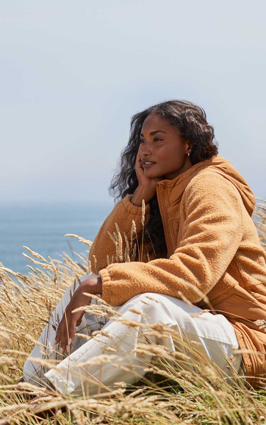 Woman wearing a jacket and pants
