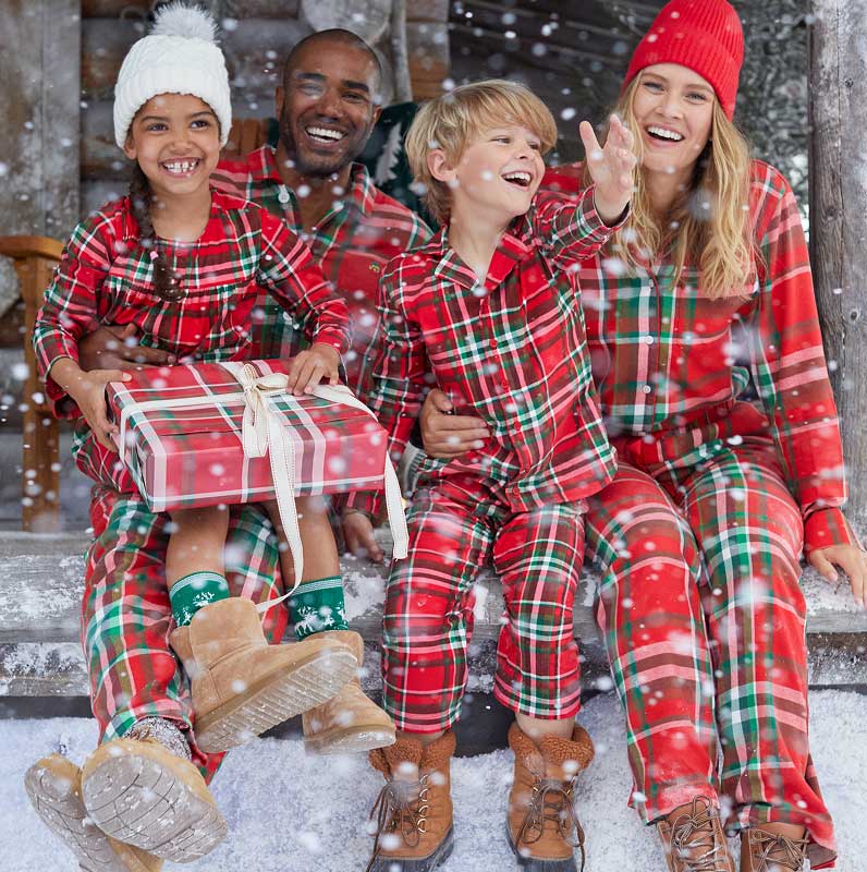 Family wearing matching pajamas