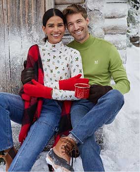 Woman and man wearing turtlenecks, pants and gloves