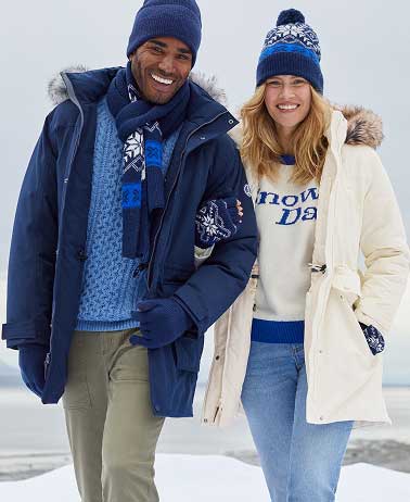 People wearing coats, sweaters, pants, hats and gloves