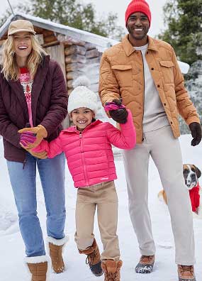 People wearing coats, sweaters, pants and hats