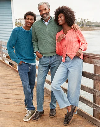 Family wearing Drifter sweaters and denim