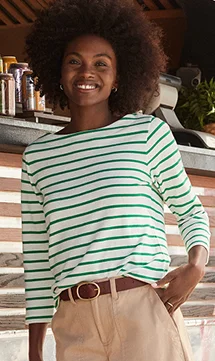 Woman wearing a tee and pants