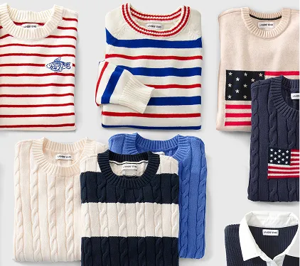 A laydown of several tops in red, white, and blue colors.