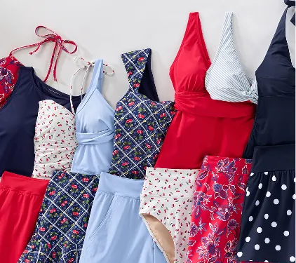 Several different swimsuit tops and bottoms mixed and matched with each other.