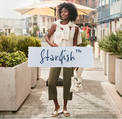 Torn paper that is labeled: Starfish&trade;. A woman wearing a white top with green pants