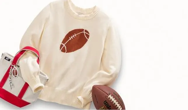 A shirt with a football on it with a tote.