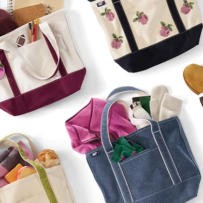 Several canvas totes in different colors and patterns.