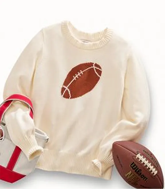 A sweater with a canvas tote and a football.