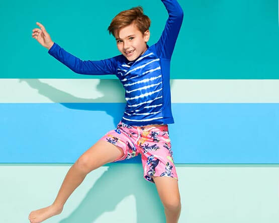 Boy wearing swim trunks