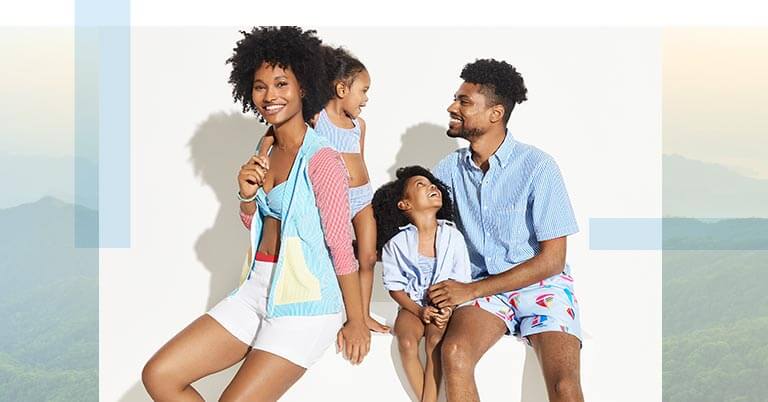 A family wearing swimwear