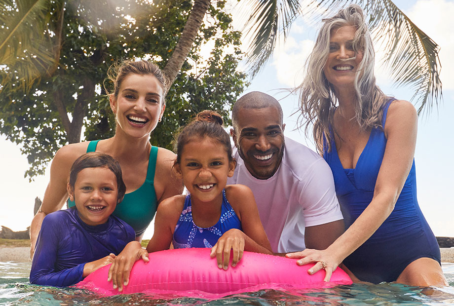 Family wearing swimwear