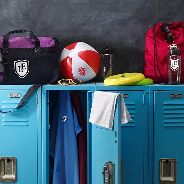Blue school lockers filled with Lands’ End embroidered product.