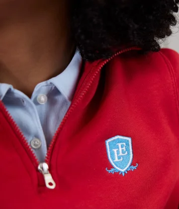 A custom logo red sweater.