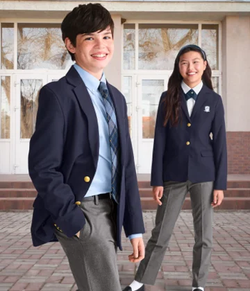 Kids wearing school uniforms with blazers.
