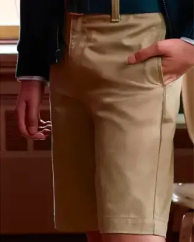 A student wearing khaki shorts.