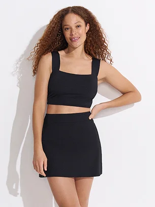 Woman wearing a square neck swimsuit